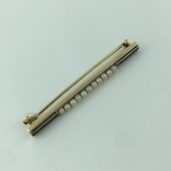 Prendedor en oro 18 K