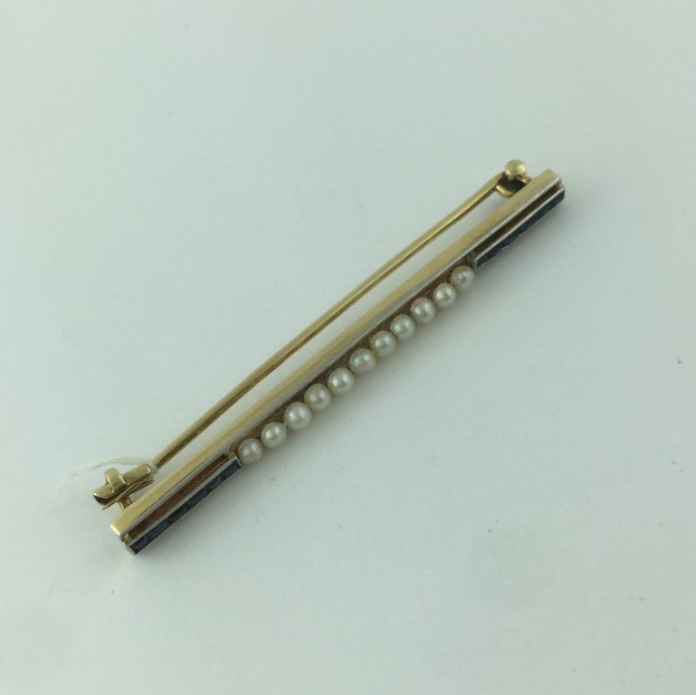 Prendedor en oro 18 K