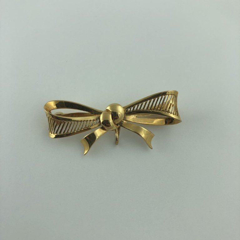 Prendedor en oro 18 K