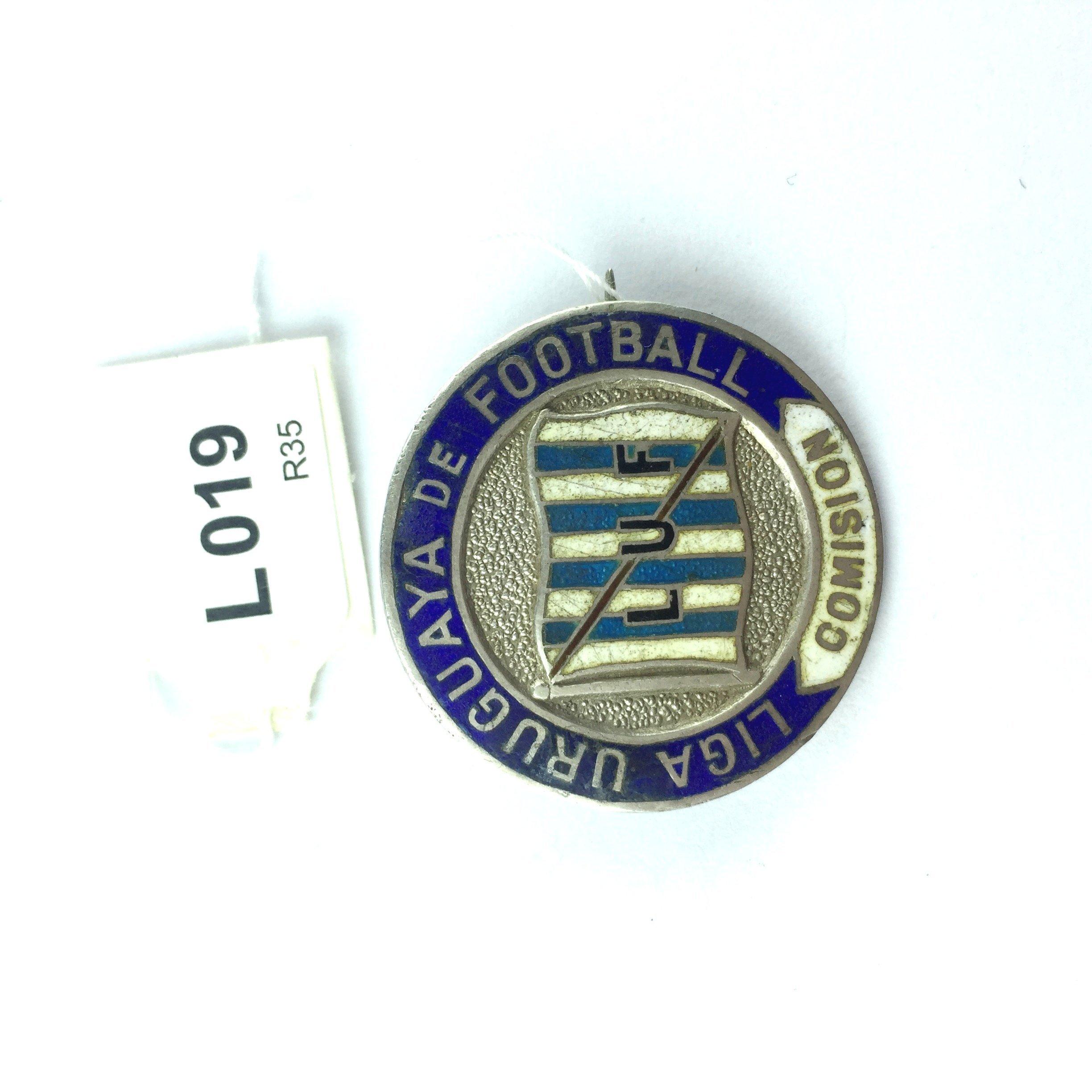 Distintivo en plata