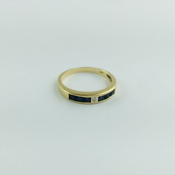 Anillo oro 18 K, brillante y zafiros