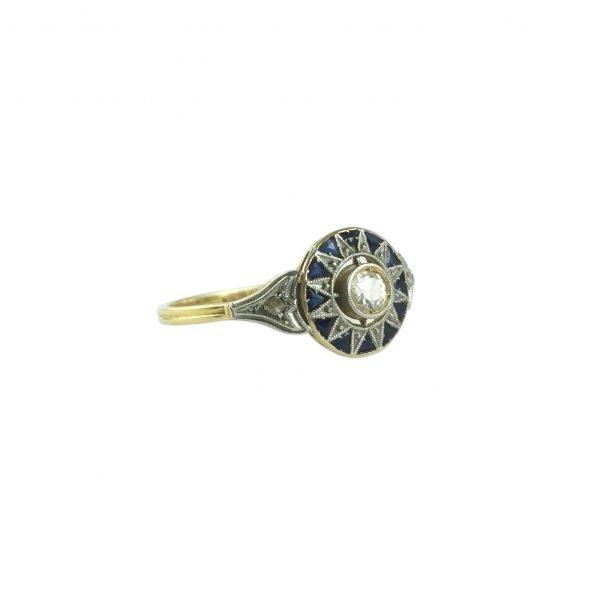 Anillo oro 18, brillante, zafiro y diamantes