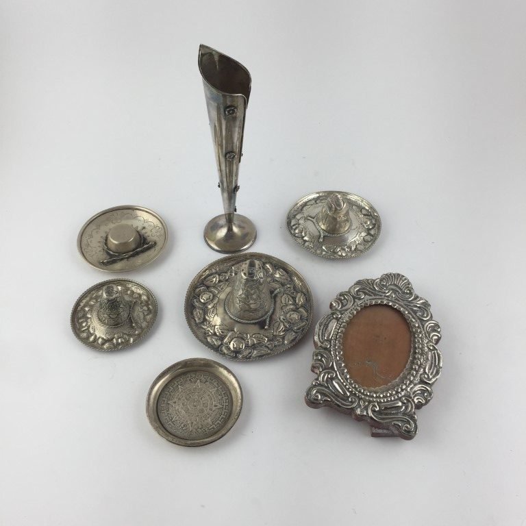 Siete piezas en plata