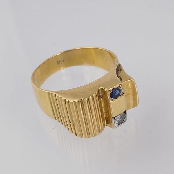 Anillo oro 18 K, brillante y zafiro
