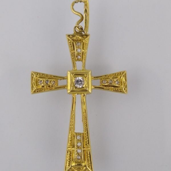 Cruz oro 18 K, brillante y diamantes