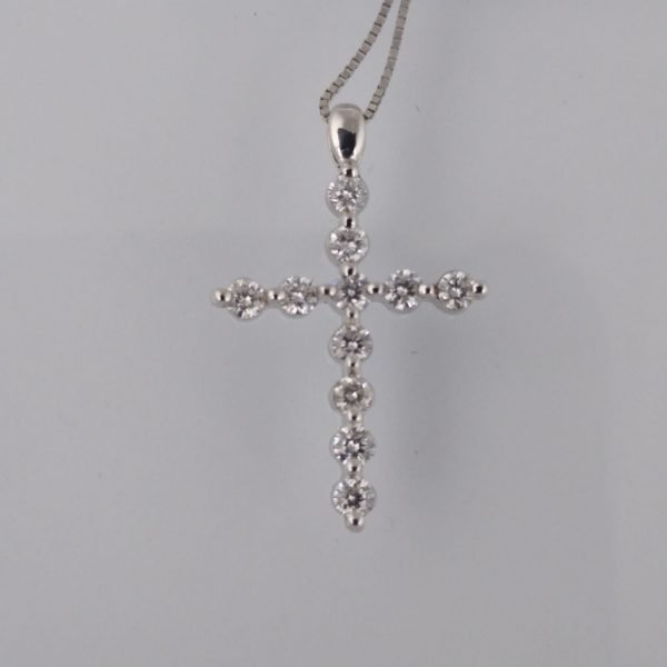 Cruz oro 18 K y brillantes