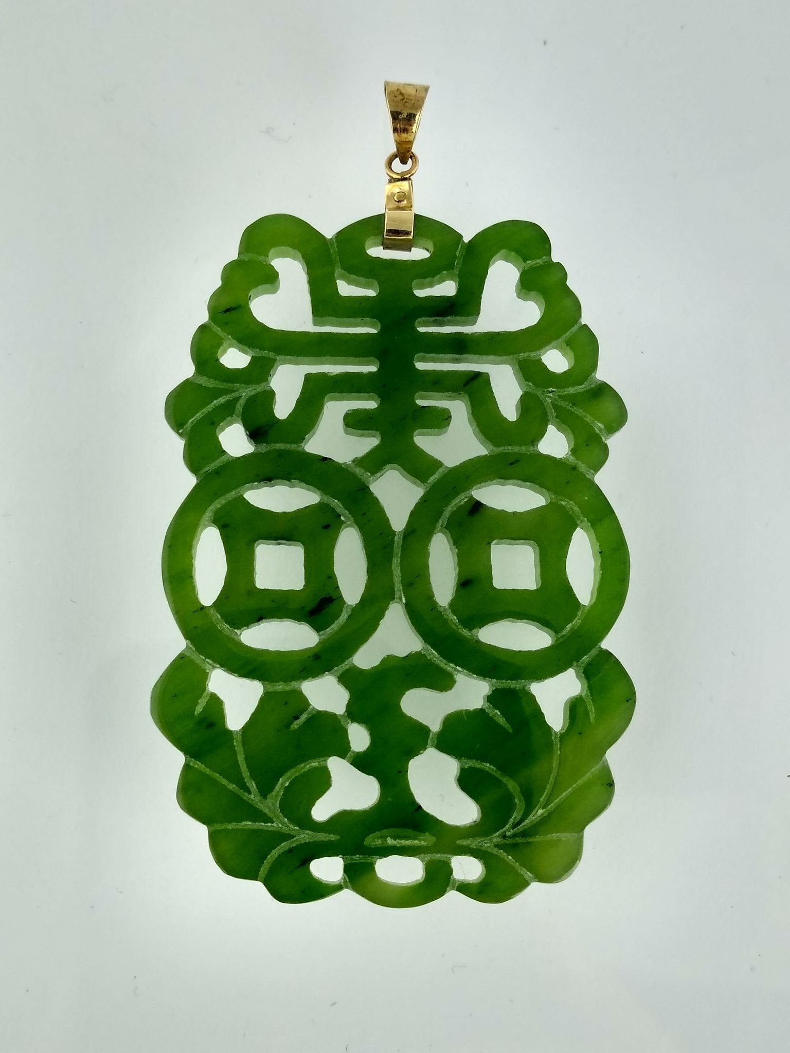 Colgante chino en jade y oro