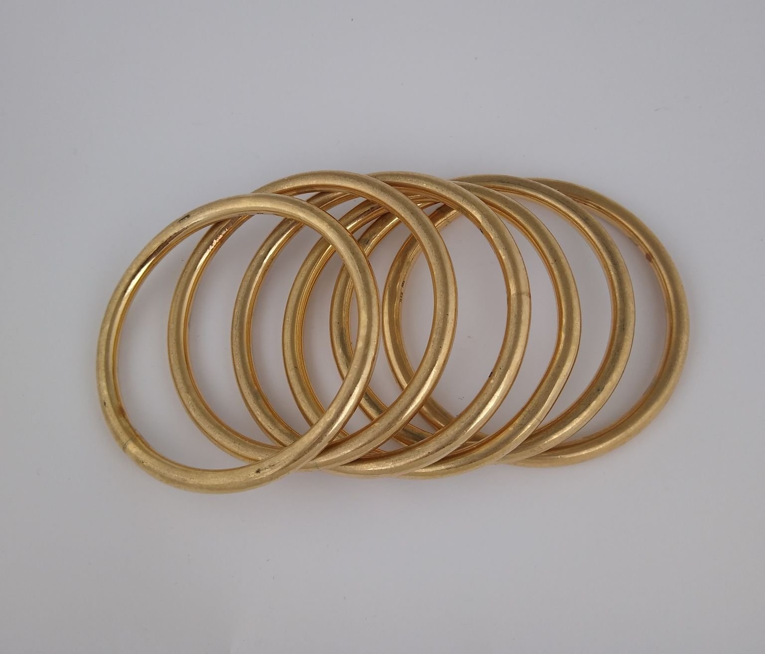 Seis escalvas oro