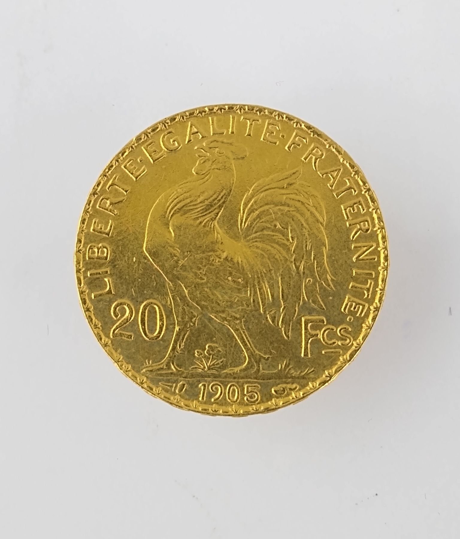 Moneda oro