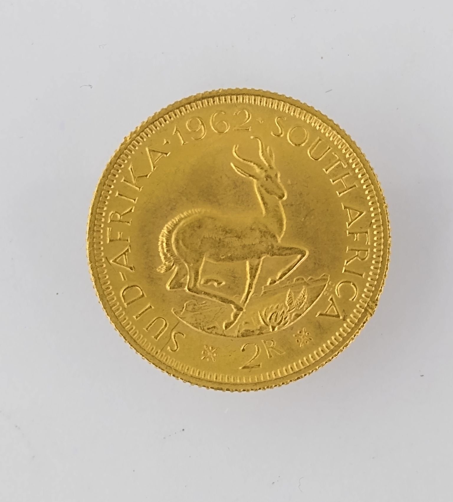 Moneda oro