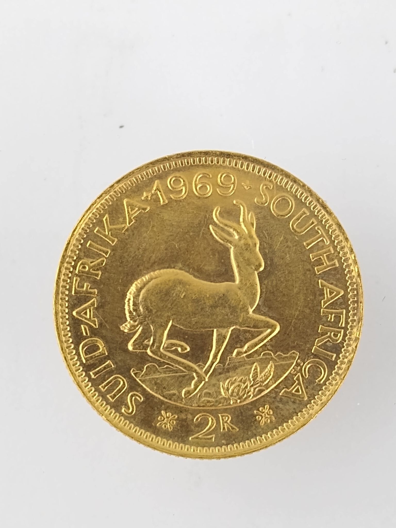 Moneda oro