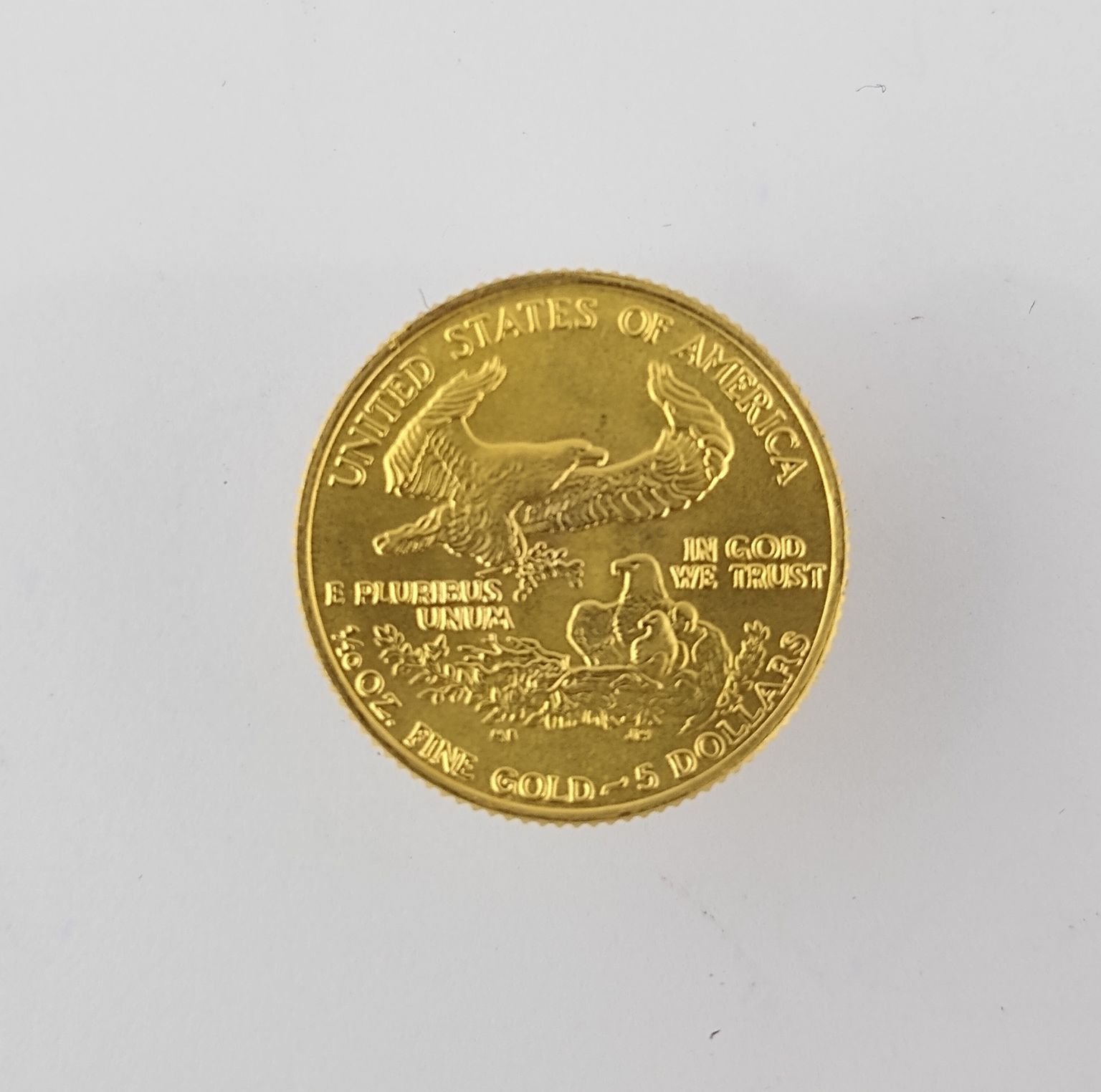 Moneda oro