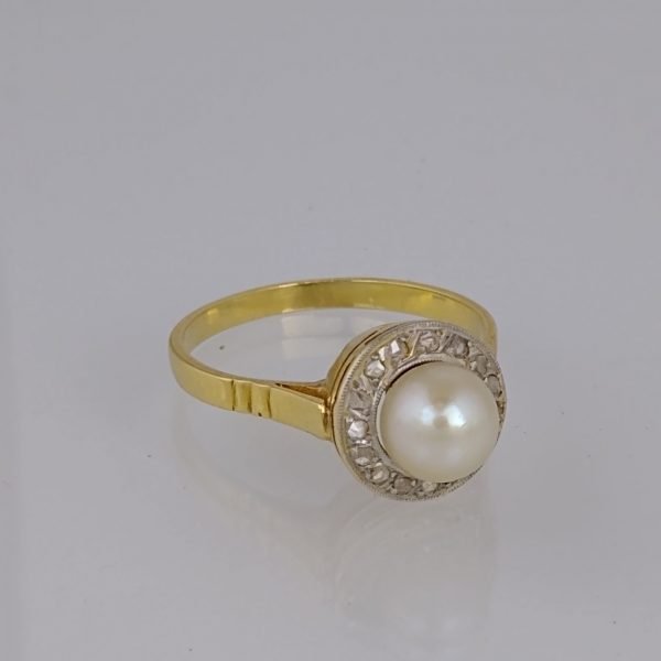 Anillo oro 18 K, perla y diamantes