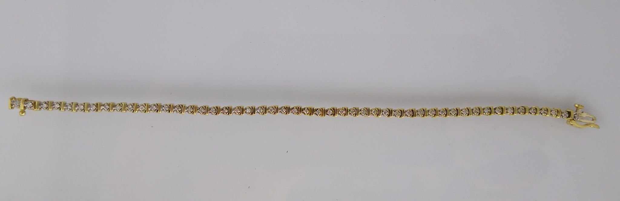 Pulsera oro 18 K y brillantes