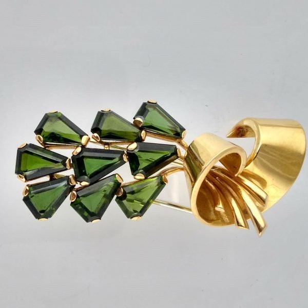 Prendedor oro 18 K y turmalinas