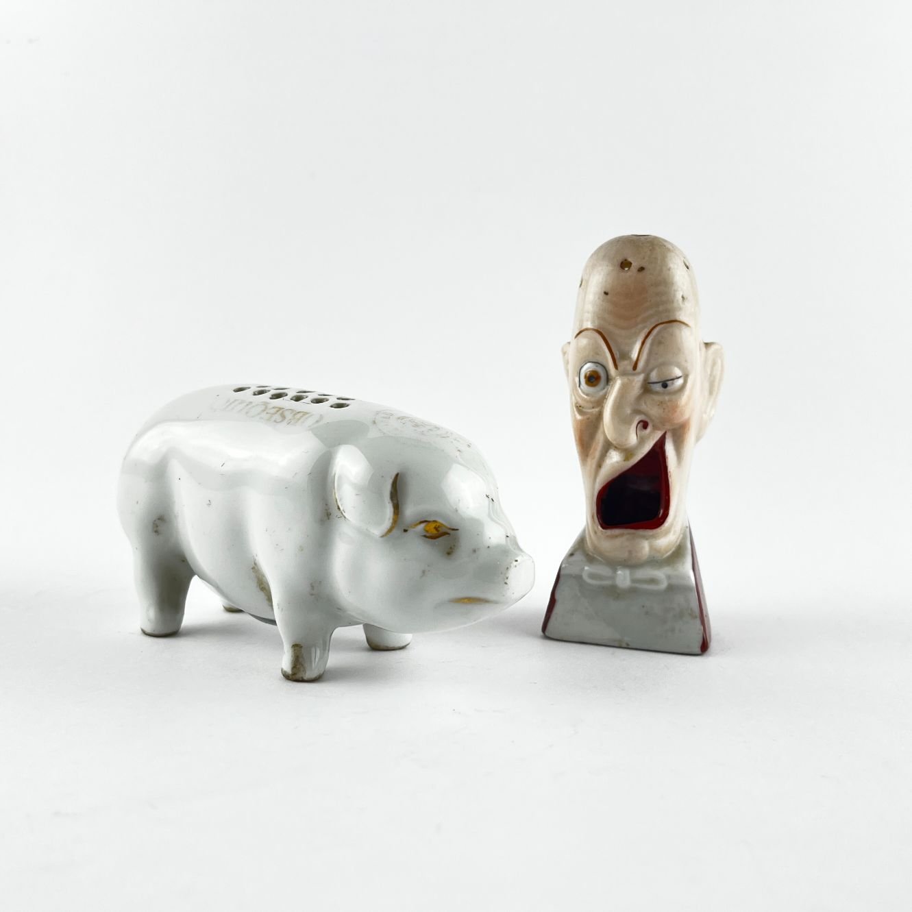 Par de paliteros en porcelana