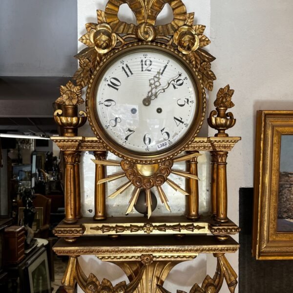 Reloj de pared estilo Luis XVI