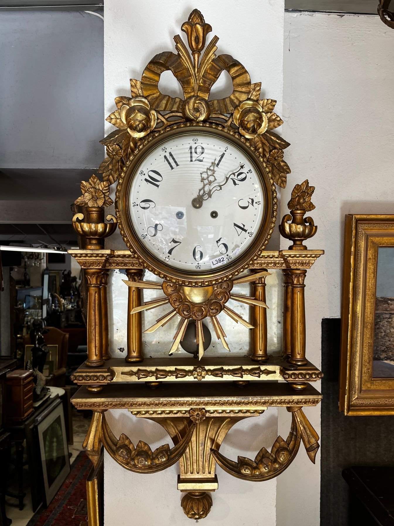Reloj de pared estilo Luis XVI