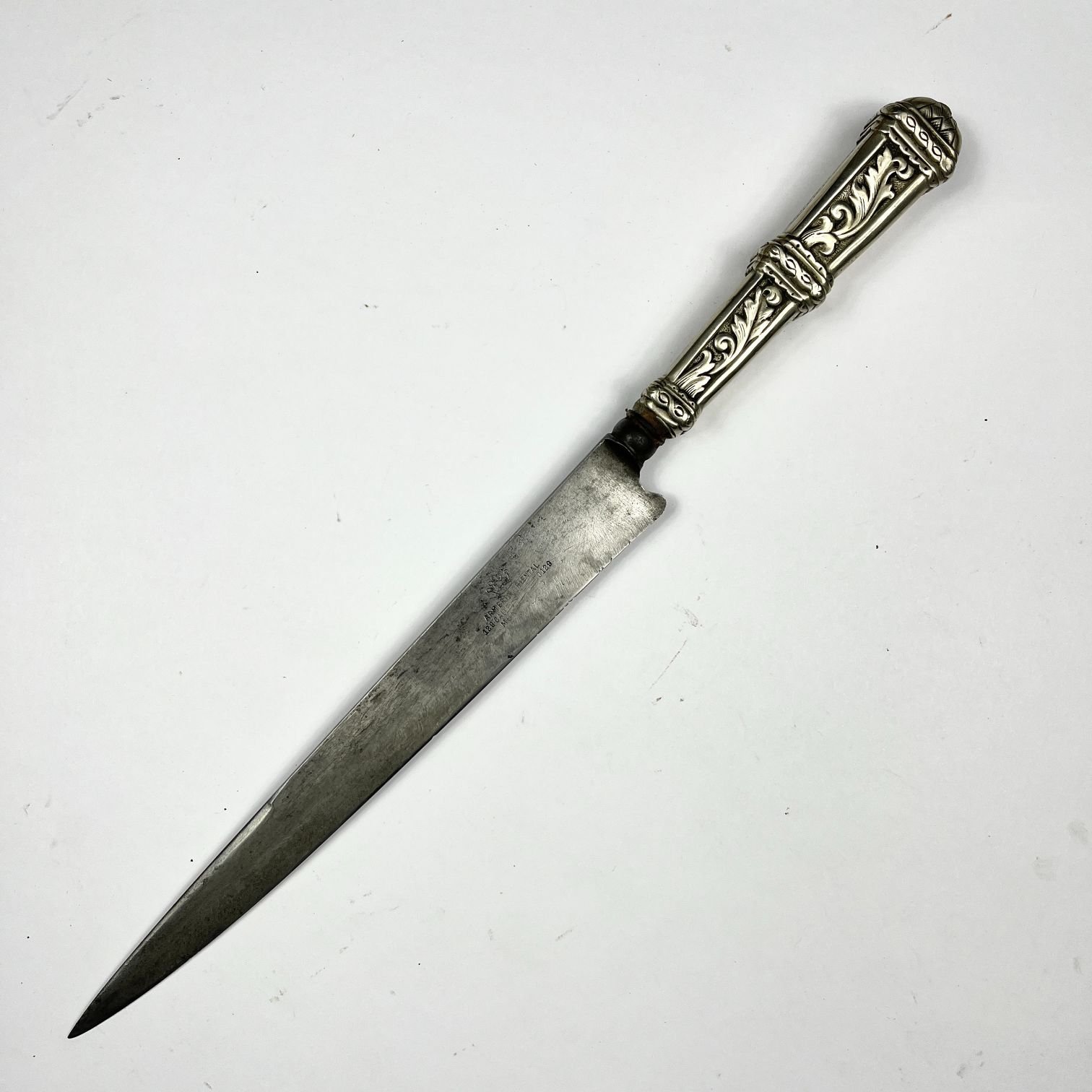 Cuchillo criollo "Armería Oriental" en metal blanco