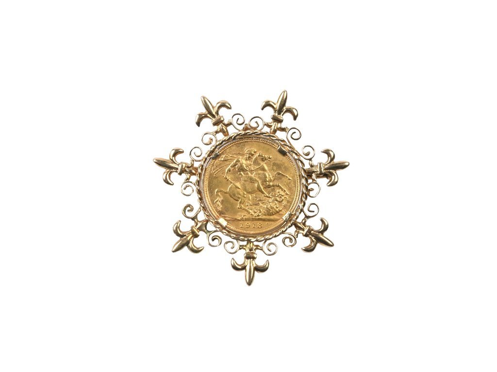 Prendedor oro 18 K