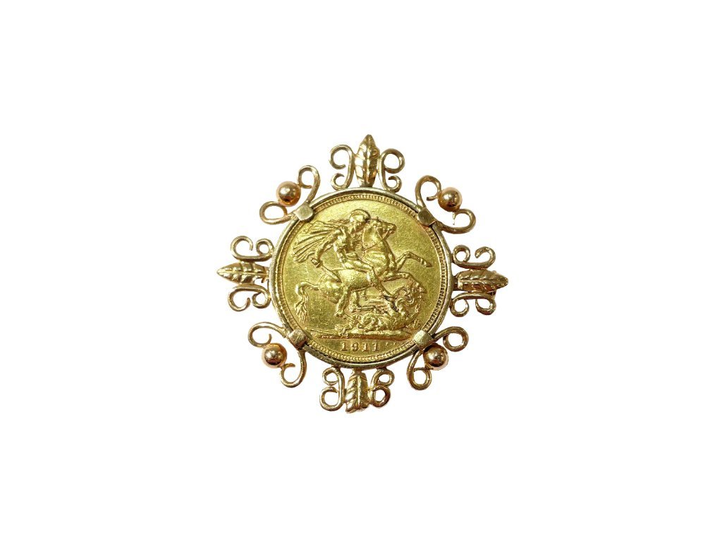 Prendedor oro 18 K