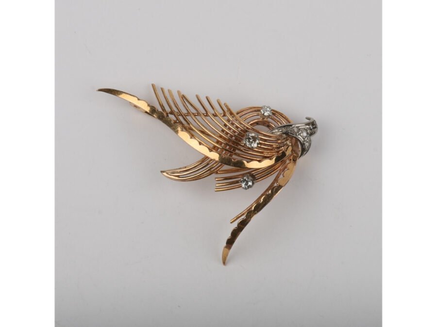 Prendedor oro 18 K y brillantes
