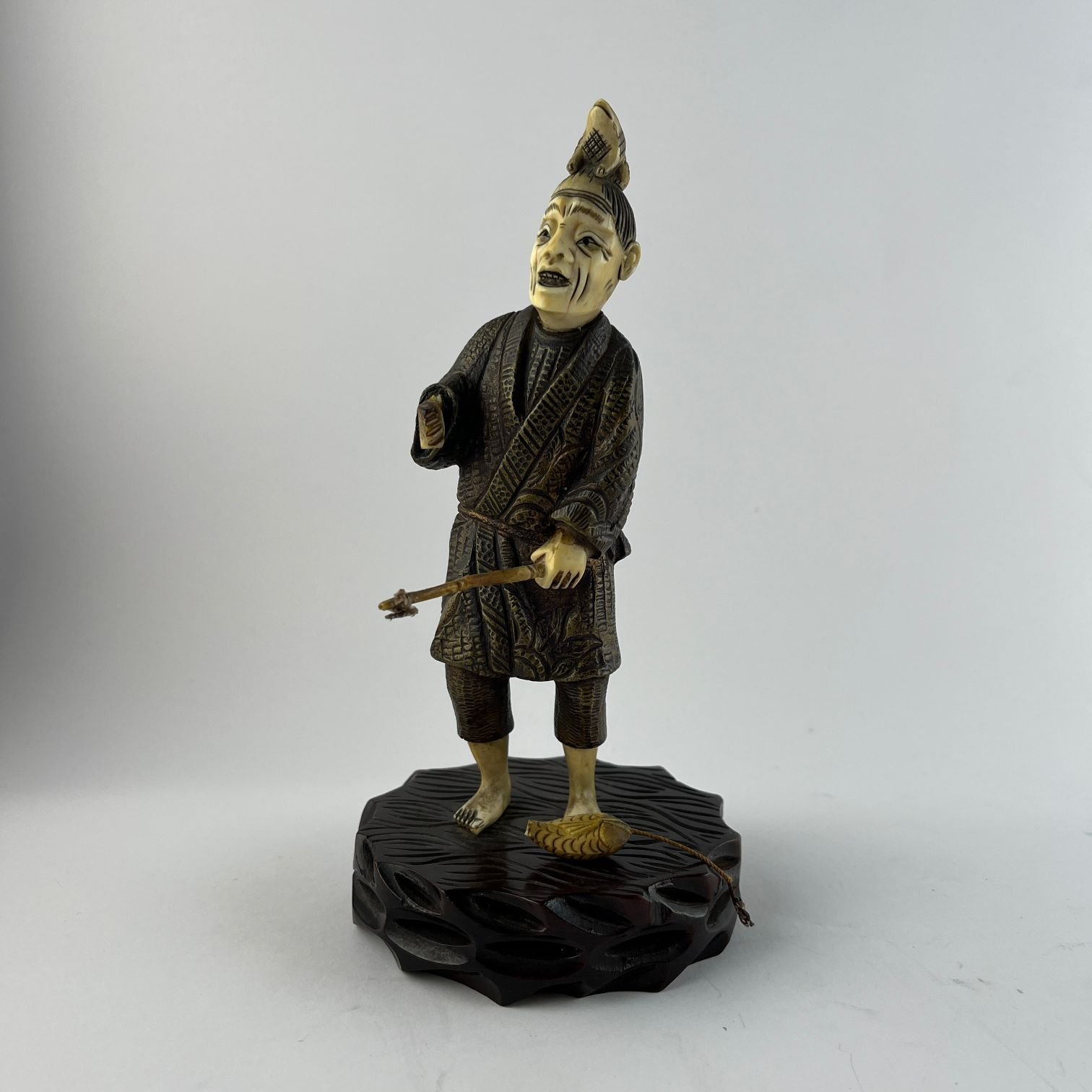 Escultura japonesa okimono