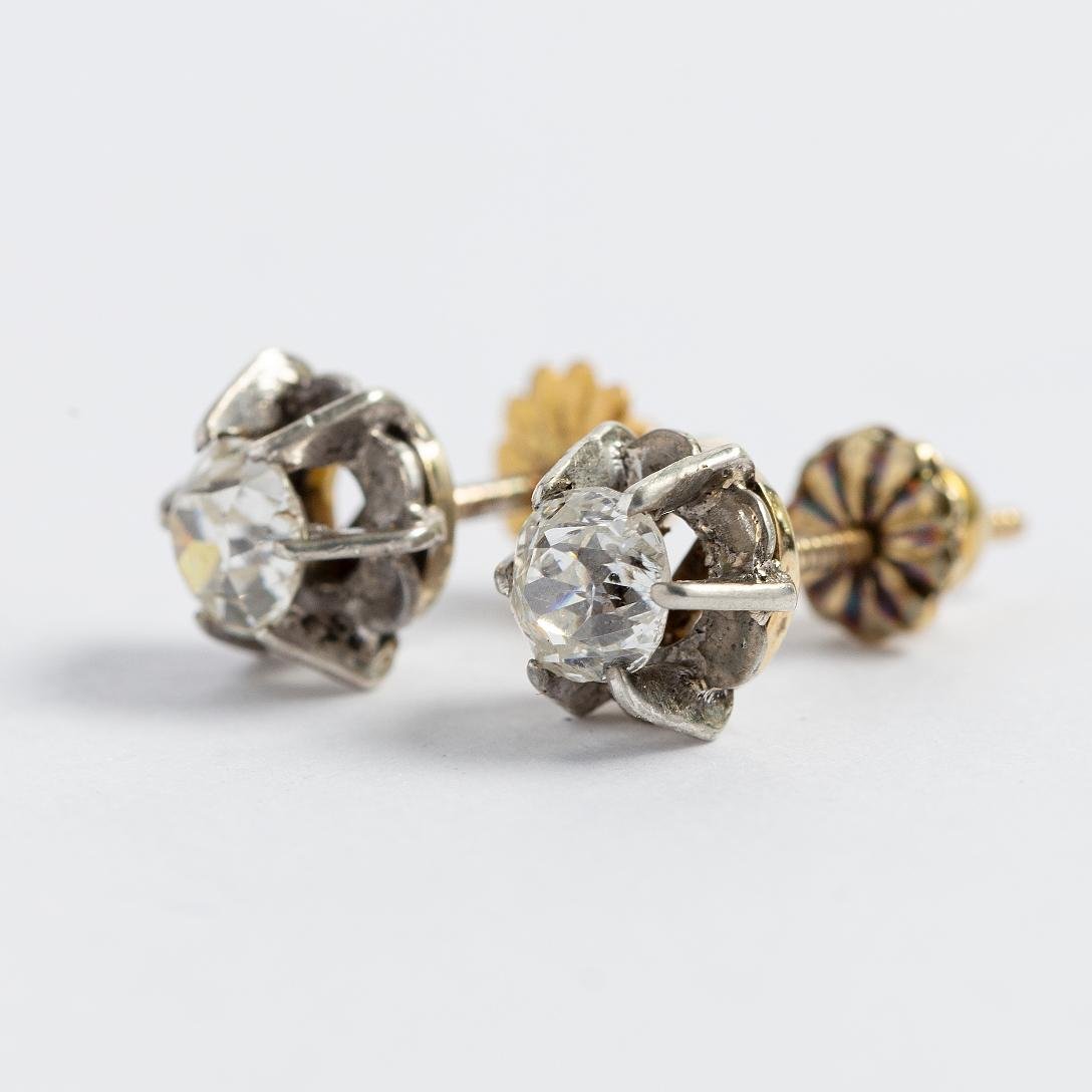 Par de tornillos oro 18 K Y brillante