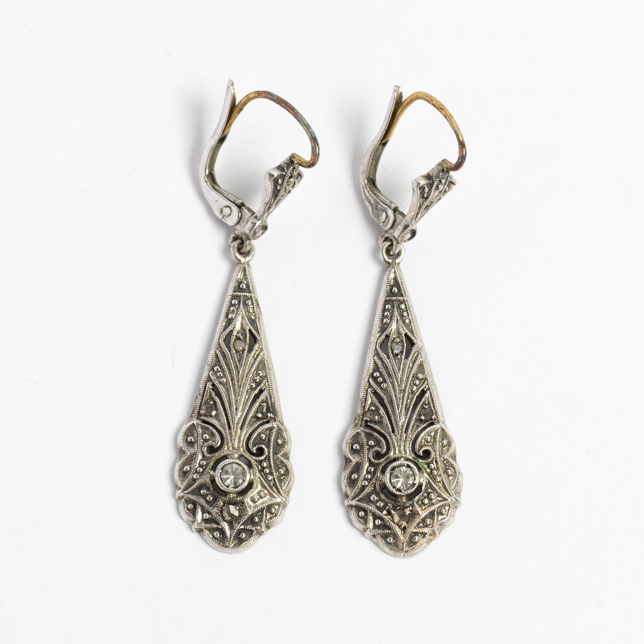 Par de caravanas art decó plata, oro y zirconias