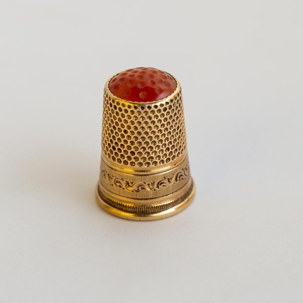 Dedal oro y ámbar