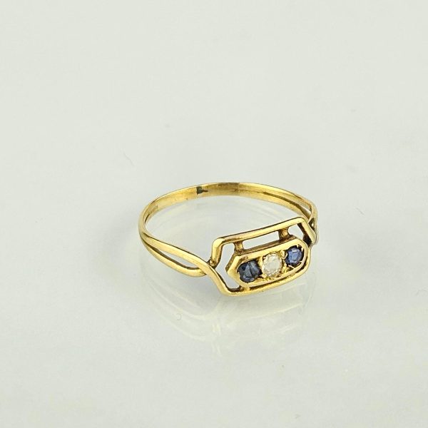 Anillo oro 18 K amarillo, zafiro y brillante