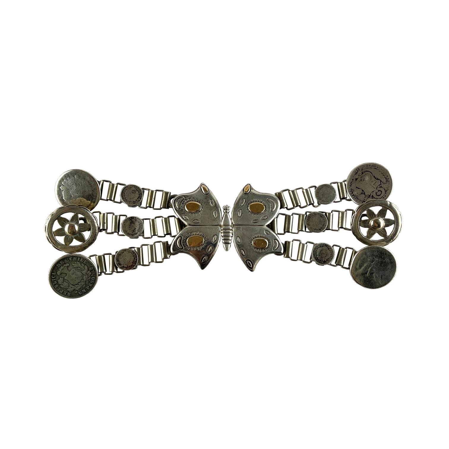 Rastra en plata y oro