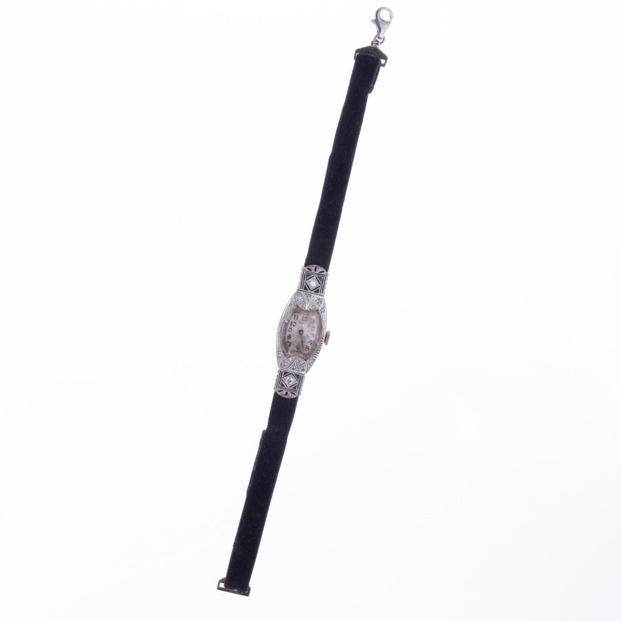 Reloj pulsera art decó en platino con diamantes y zafiros