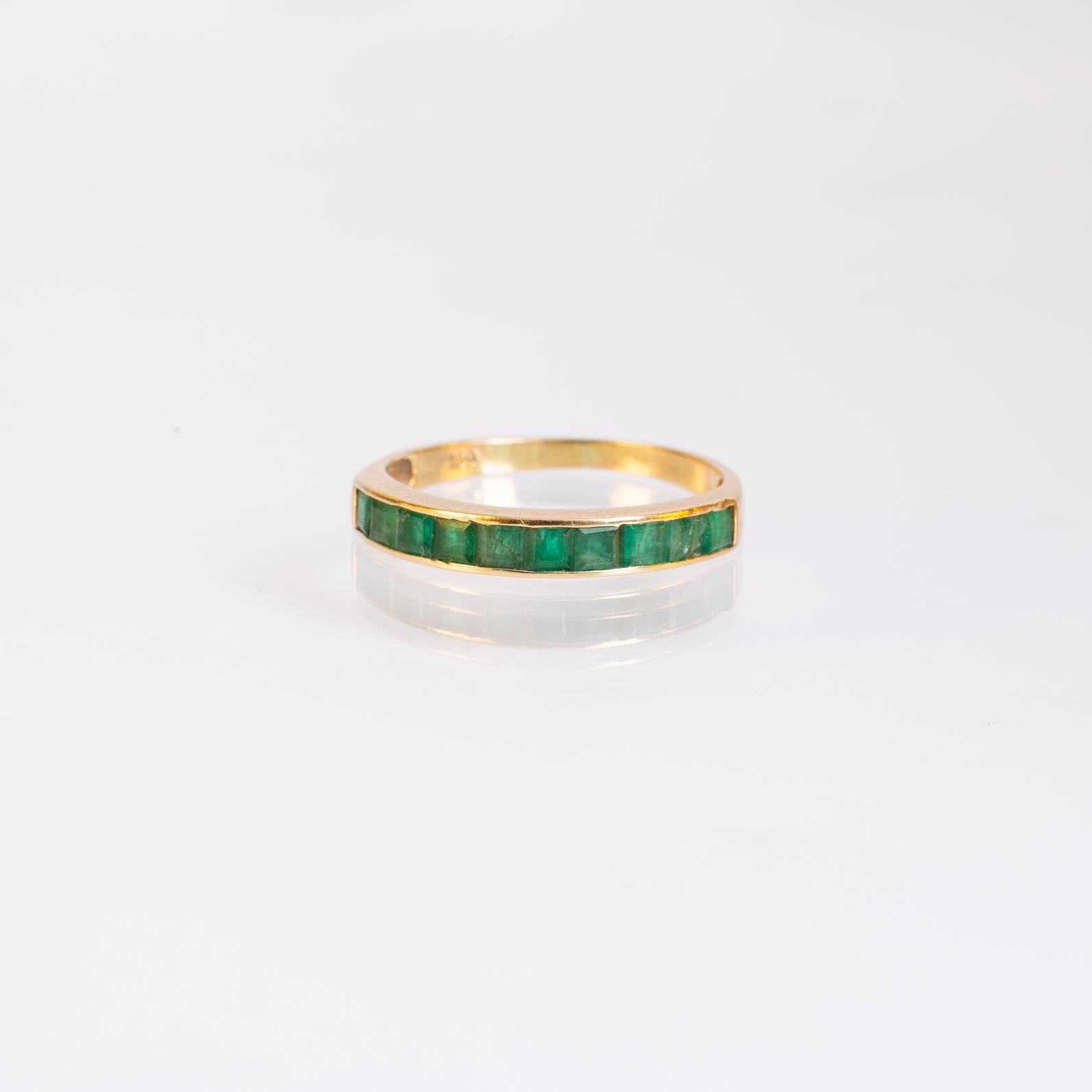 Anillo oro 18 K amarillo y esmeraldas