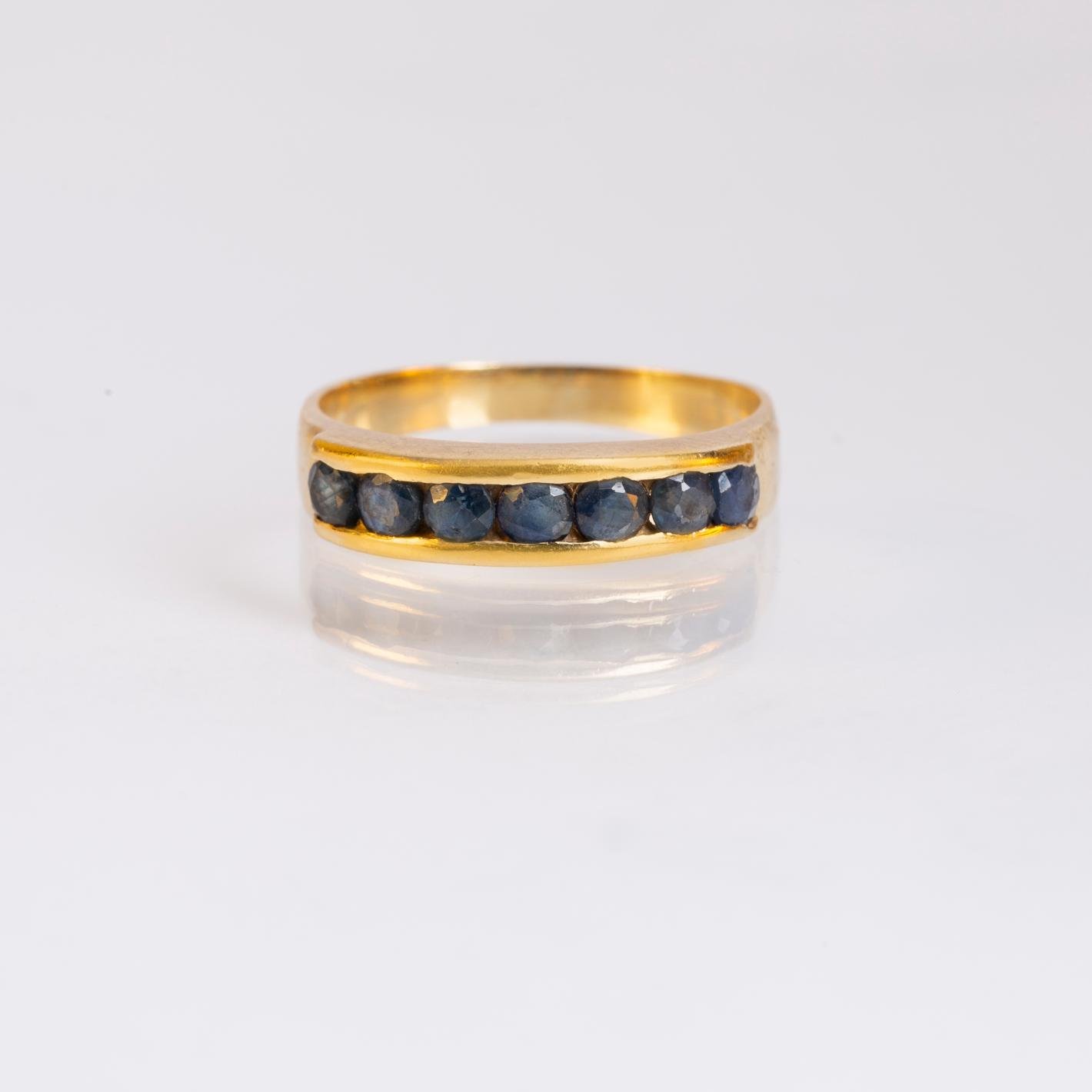 Anillo oro 18 K amarillo y zafiros