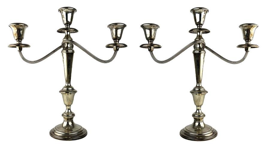 Par de candelabros tres luces en plata