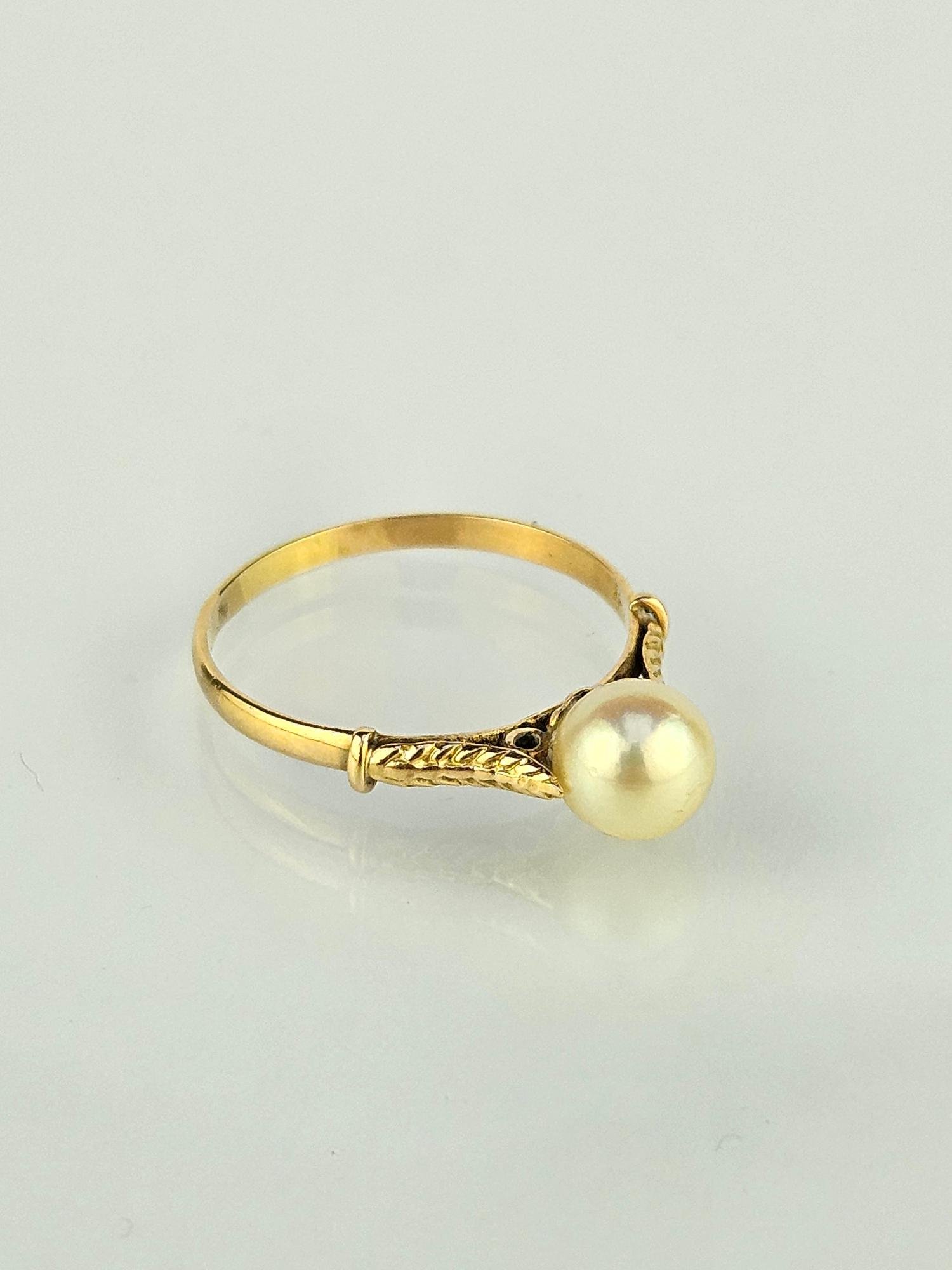 Anillo oro 18 K amarillo y perla