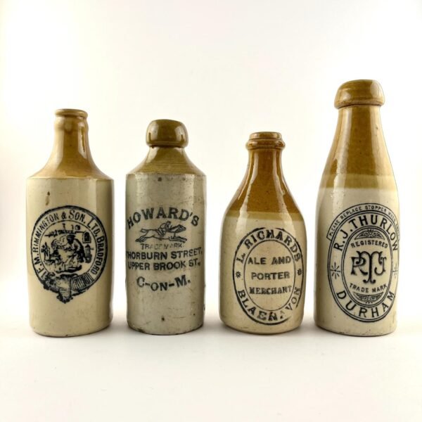 Cuatro botellas en gres