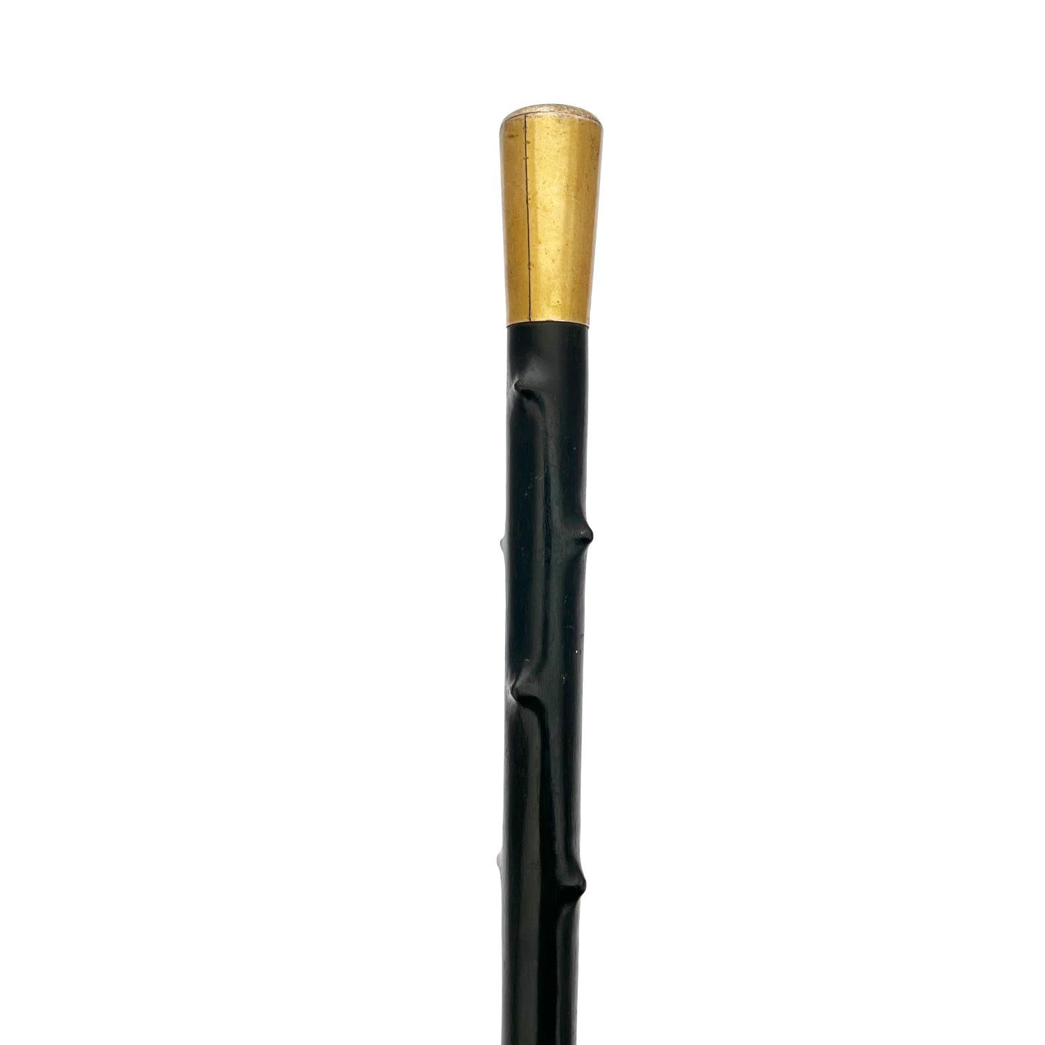 Bastón en madera, oro y bronce