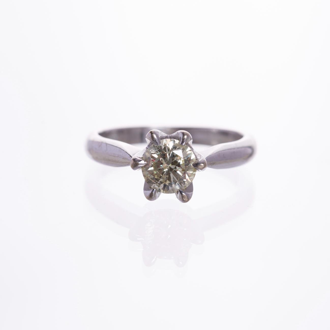Anillo solitario en oro 14 K con brillante