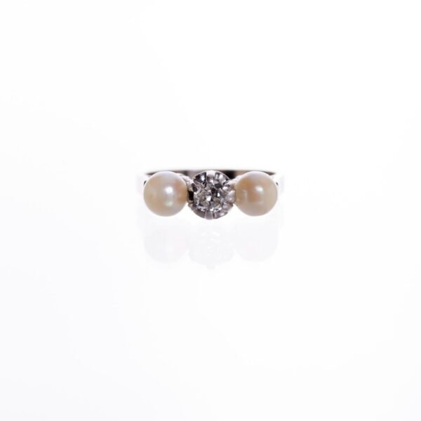 Anillo en oro 18 K con brillante y perlas