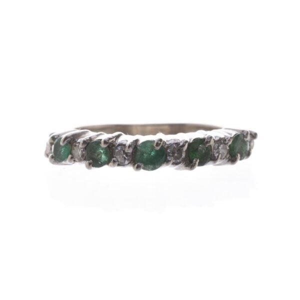 Anilloen or 18 K con brillantes y esmeraldas