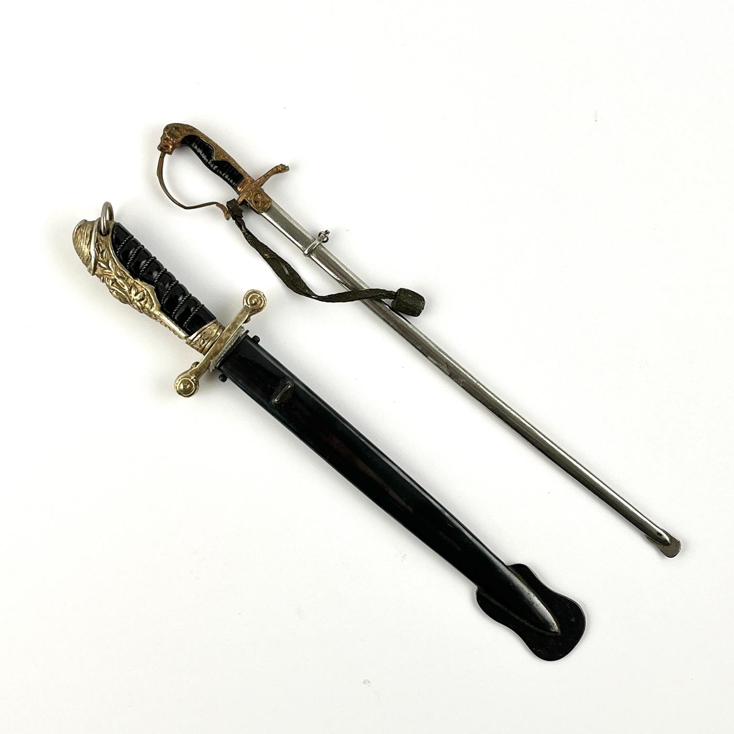 Miniaturas de espadín y sable