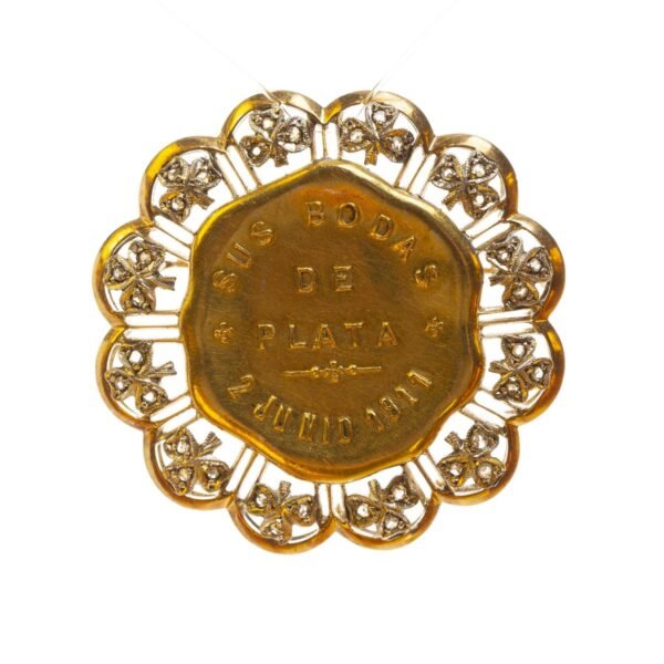 Prendedor en oro y diamantes