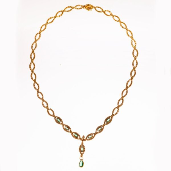 Gargantilla en oro 18 K, brillantes y esmeraldas