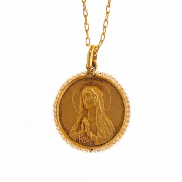 Medalla en oro 18 K y perlas
