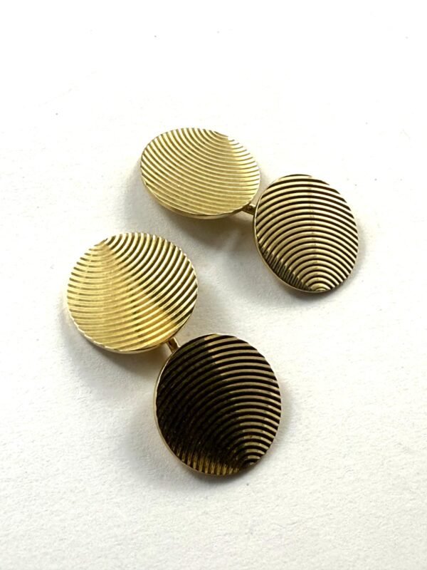 Par de gemelos en oro 14 K