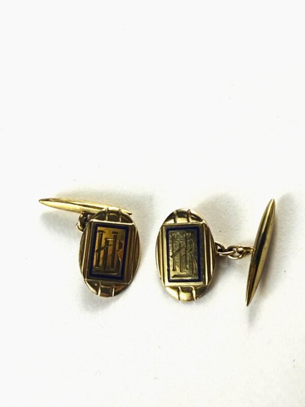 Par de gemelos en oro 18 K y esmalte