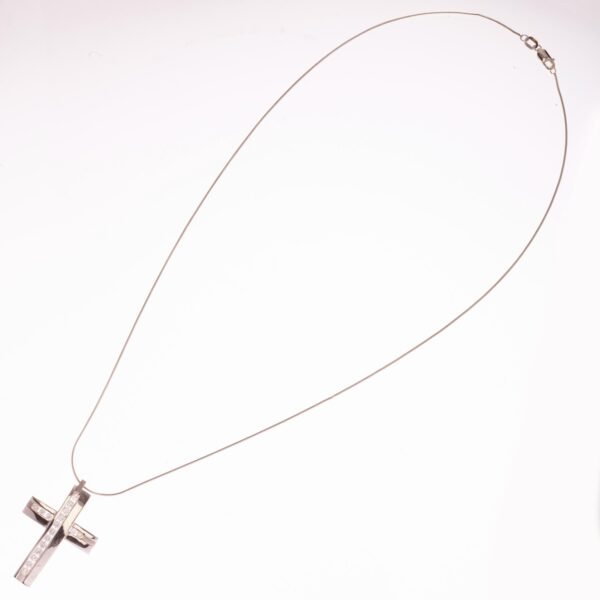 Cruz en oro 18 K y brillantes