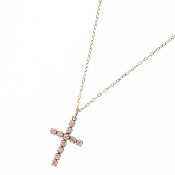 Cruz en oro 18 K y brillantes